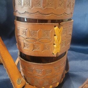 (J19) Vintage Handcrafted Leather wine bottle holder.